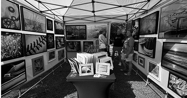 One of 123 artists’ booths at Bluff Park Art Show. See more details inside this edition.