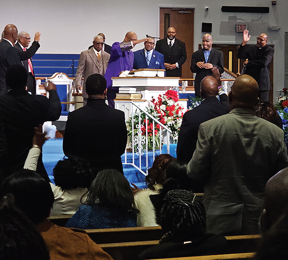 Pastor Scott delivers moving message during memorial
service.