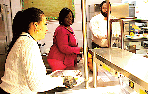Top: Staff, city officials, and Abrams Elementary Royal Court. Next: Ms. Allen, Commissioner
Tyson and helpers serve a memorable Valentine's Dinner.