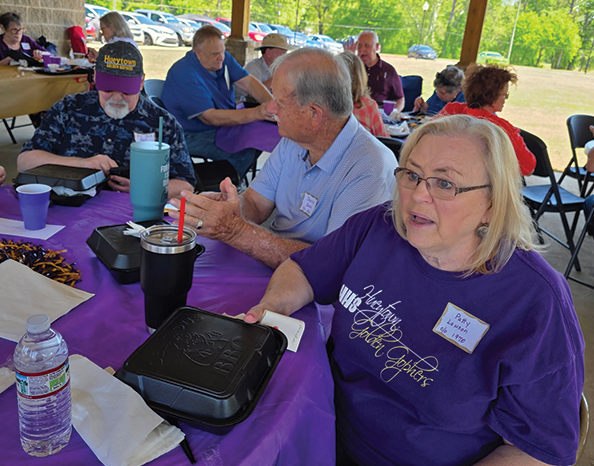 Patty Lawson chatting with former classmates