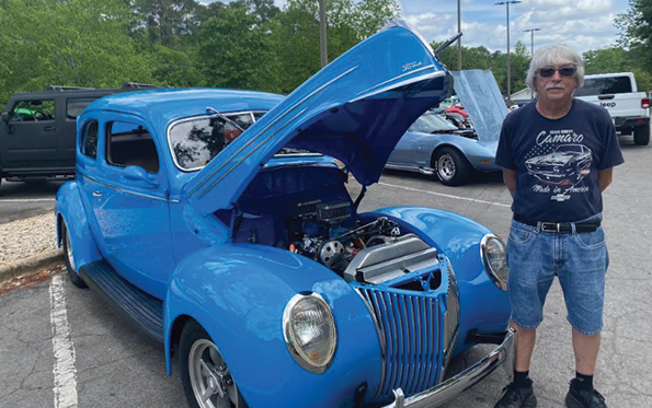 Freddy Walton with his 1939 Ford Deluxe Sedan