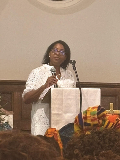 Hamilton Hood Founder, Yamona Pierce addresses audience
at Juneteenth program.