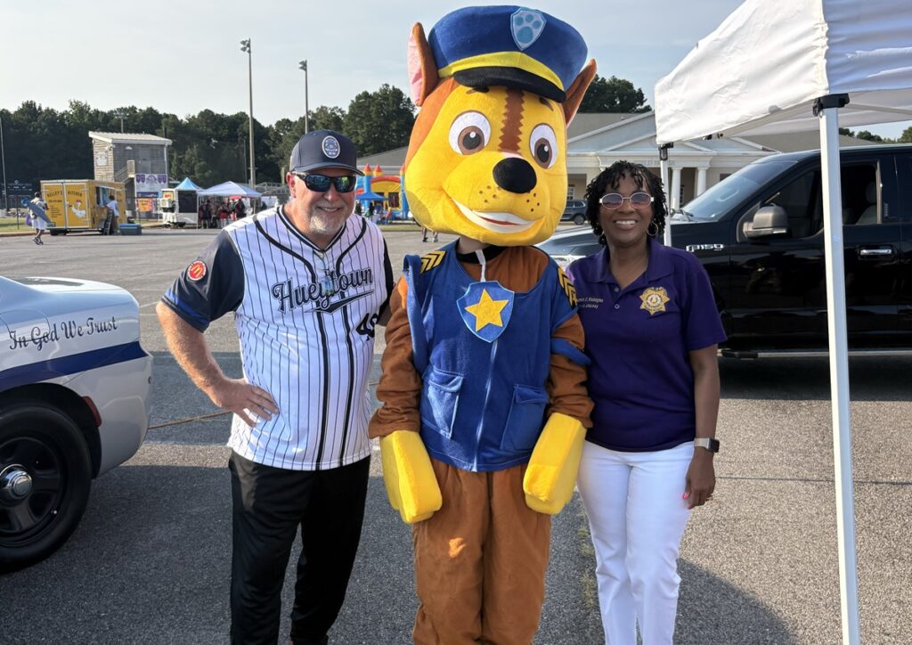 Hueytown Police Chief Michael Yarbrough, Chase
from Paw Patrol and Bessemer Cutoff District Attorney
Lynneice Washington at National Night Out.