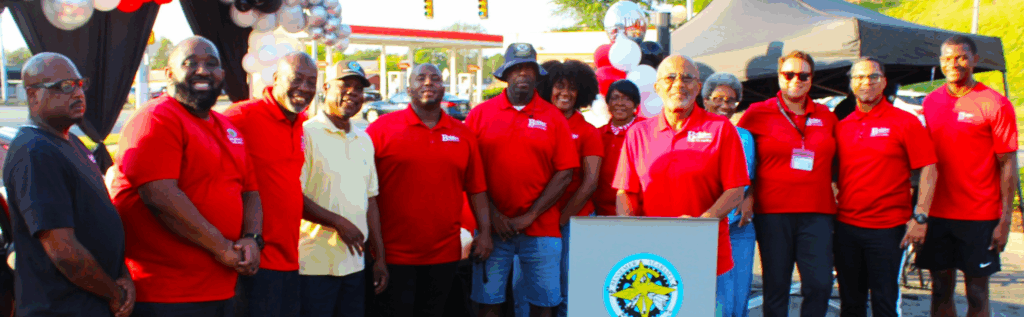 Alton Woodard, the center's first director, with director Makeda Smith and staff during
the anniversary celebration