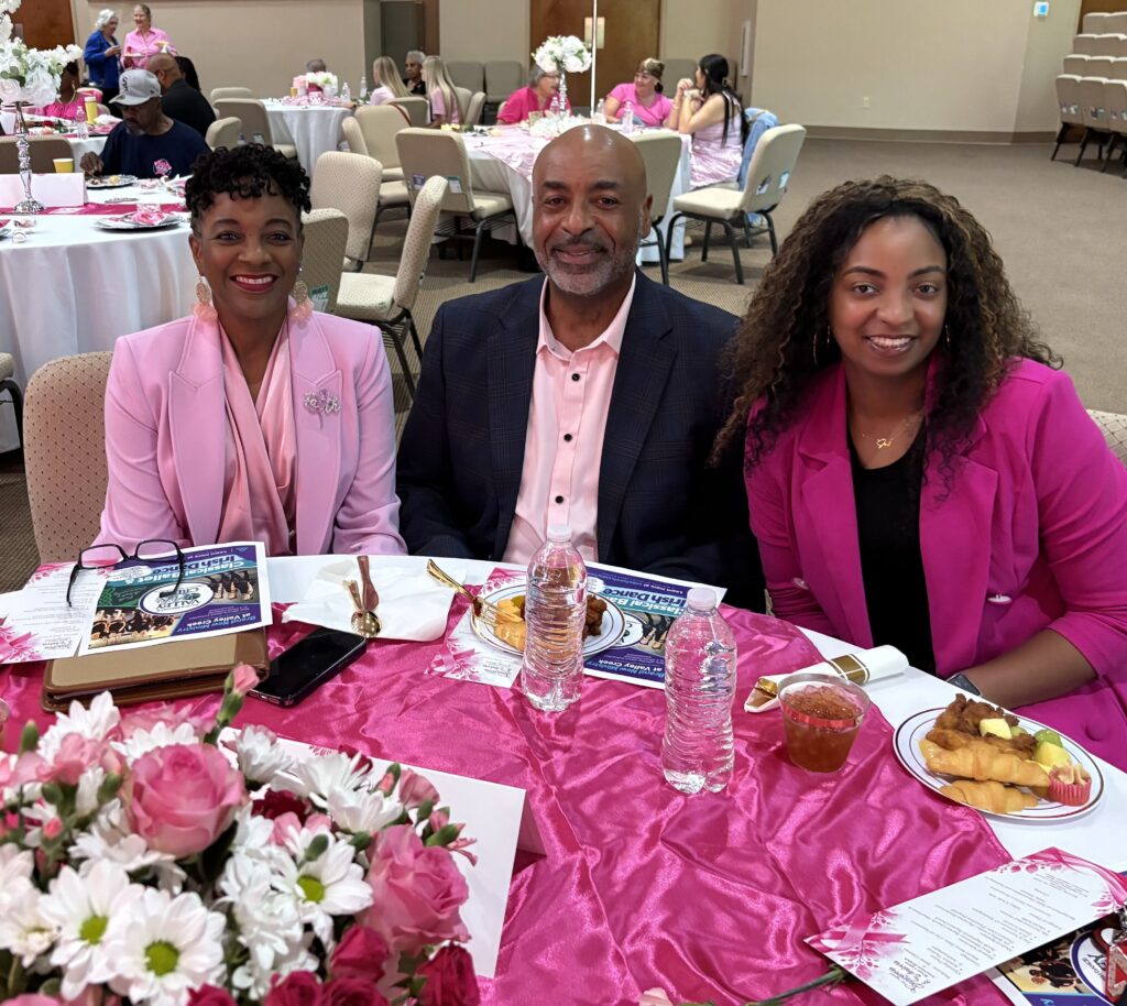 District Attorney Lynneice Washington and Jude Washington with Jaidyn Washington