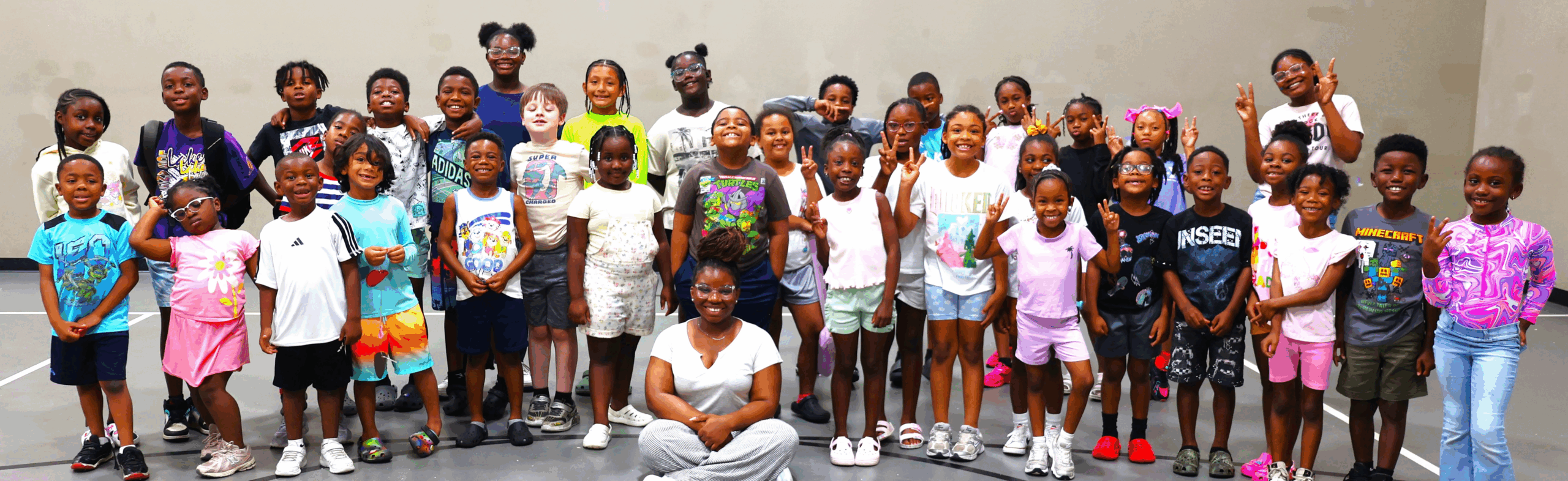 Many’ Janay Weems, child care program director at Bessemer's Legacy YMCA.(above)
